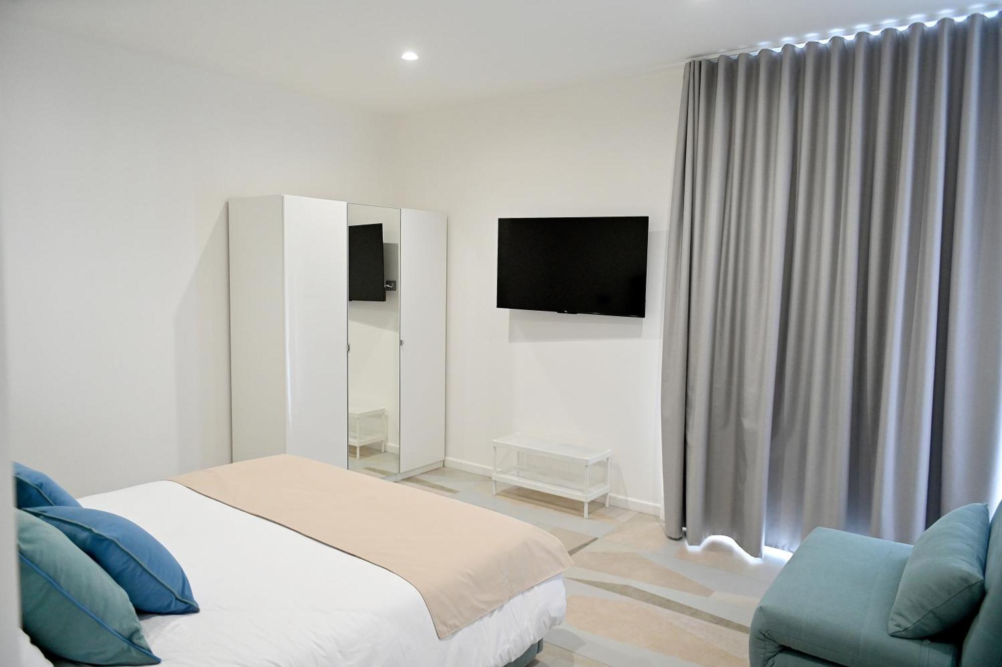 Camera Matrimoniale con Letto Supplementare